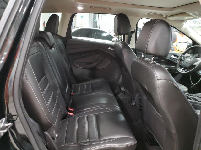 Photo 11 from auction – 2017 FORD ESCAPE SE with VIN 1FMCU9G98HUE78760