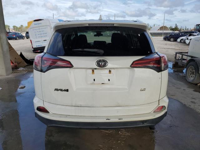 Photo 6 from auction – 2018 TOYOTA RAV4 LE with VIN 2T3ZFREV6JW412211