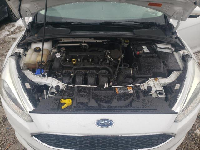Photo 11 from auction – 2015 FORD FOCUS SE with VIN 1FADP3F2XFL240094