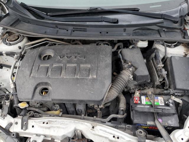 Photo 11 from auction – 2014 TOYOTA COROLLA L with VIN 5YFBURHEXEP036292