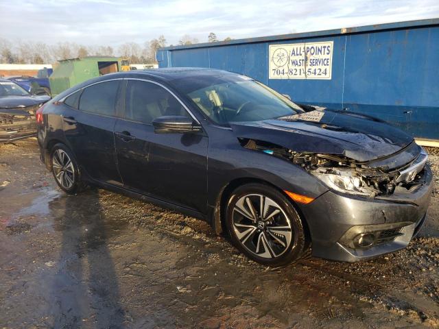 Photo 4 from auction – 2018 HONDA CIVIC EX with VIN 2HGFC1F39JH643471