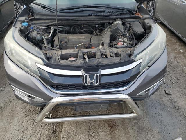 Photo 11 from auction – 2015 HONDA CR-V EX with VIN 5J6RM4H53FL032347