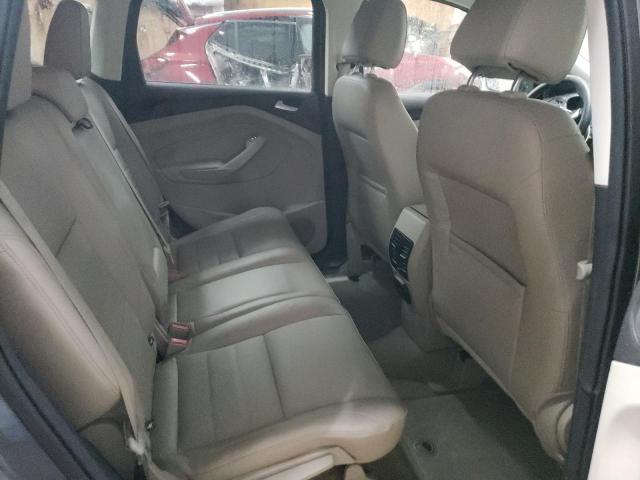 Photo 11 from auction – 2014 FORD ESCAPE TIT with VIN 1FMCU9J92EUE24634