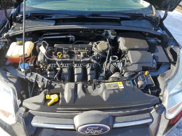 Photo 11 from auction – 2014 FORD FOCUS SE with VIN 1FADP3F21EL175750