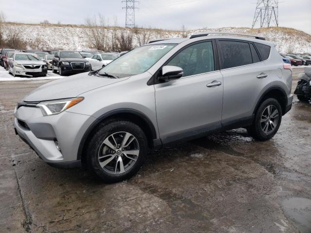 TOYOTA RAV4 XLE 2017 with VIN 2T3RFREV4HW693726 - Photo from auction