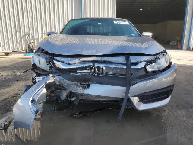 Photo 5 from auction – 2018 HONDA CIVIC LX with VIN 2HGFC4B04JH303027