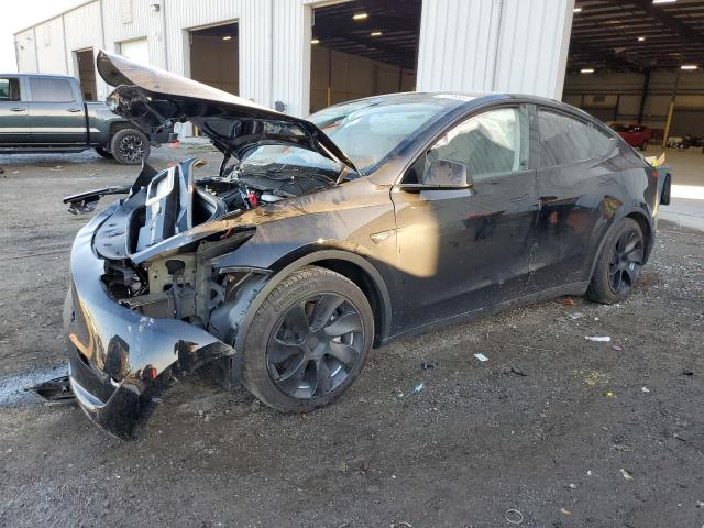 TESLA MODEL Y 2023 with VIN 7SAYGDEE1PA087123 - Photo from auction