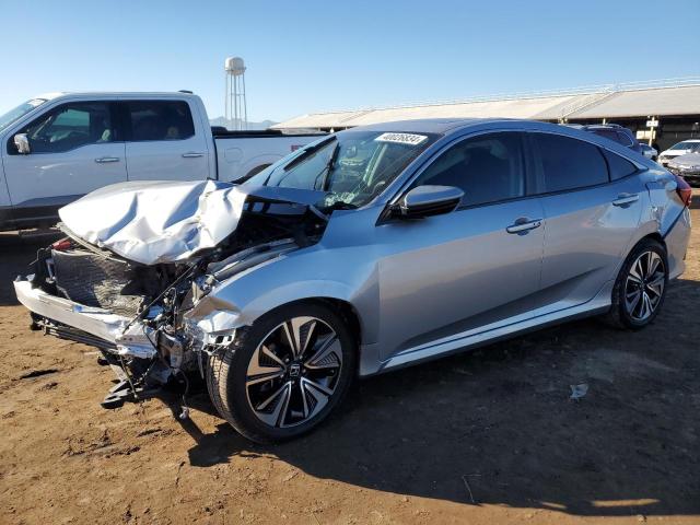 Photo 1 from auction – 2016 HONDA CIVIC EX with VIN 19XFC1F34GE024859