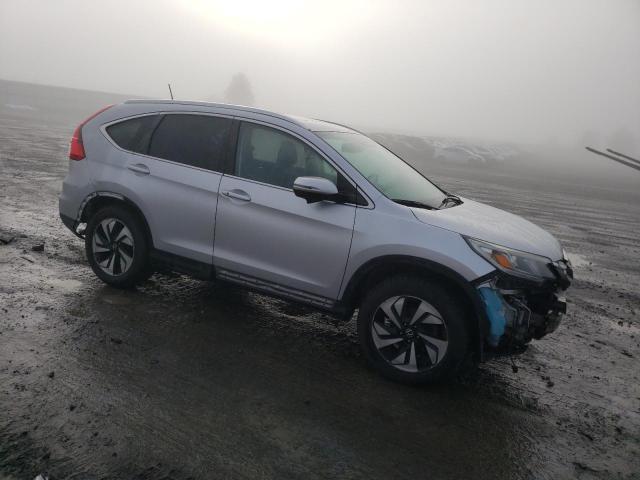 Photo 4 from auction – 2015 HONDA CR-V TOURI with VIN 5J6RM4H90FL065258