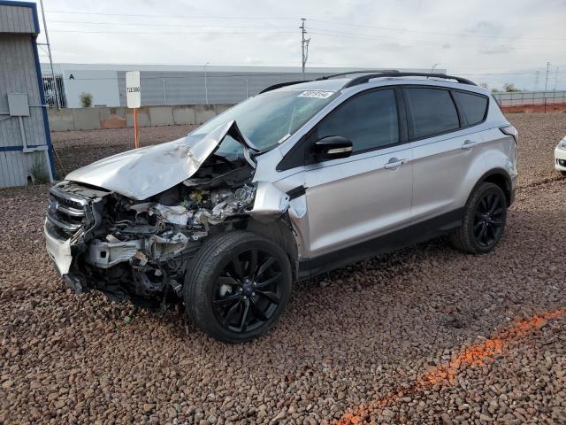 FORD ESCAPE TIT 2017 with VIN 1FMCU0J96HUC51359 - Photo from auction