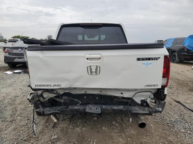 Photo 6 from auction – 2022 HONDA RIDGELINE with VIN 5FPYK3F77NB015534