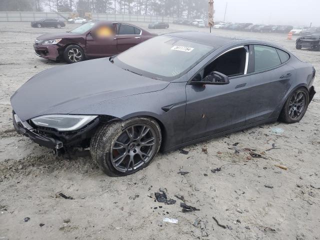 TESLA MODEL S 2023 with VIN 5YJSA1E59PF500928 - Photo from auction