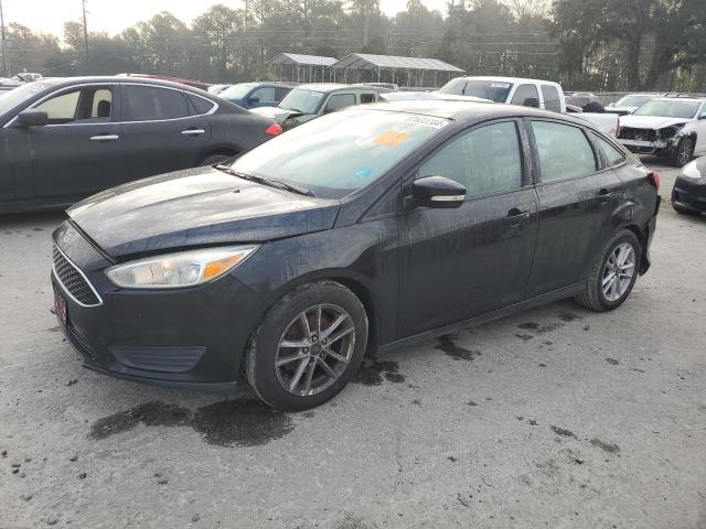 FORD FOCUS SE 2016 with VIN 1FADP3F21GL274183 - Photo from auction