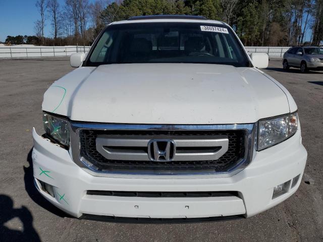 Photo 5 from auction – 2011 HONDA RIDGELINE with VIN 5FPYK1F51BB005824