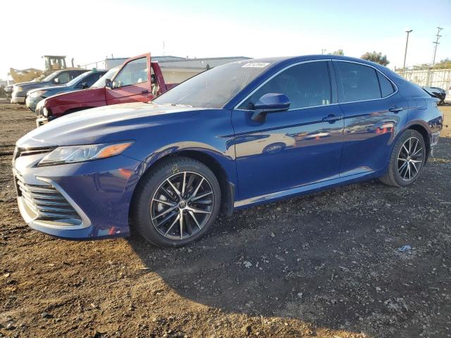 TOYOTA CAMRY LE 2023 with VIN 4T1C31AK9PU046399 - Photo from auction