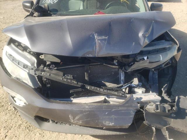 Photo 11 from auction – 2018 HONDA PILOT LX with VIN 5FNYF6H17JB024204