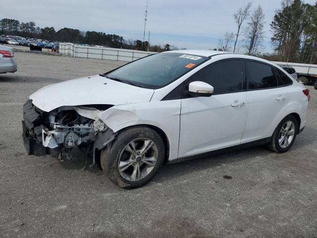 FORD FOCUS SE 2014 with VIN 1FADP3F26EL204370 - Photo from auction