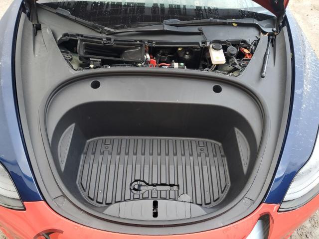 Photo 11 from auction – 2022 TESLA MODEL 3 with VIN 5YJ3E1EA5NF190585
