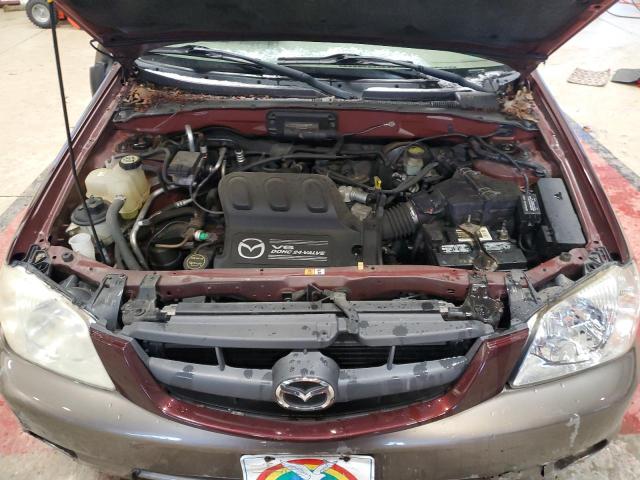 Photo 12 from auction – 2002 MAZDA TRIBUTE LX with VIN 4F2CU09122KM65254