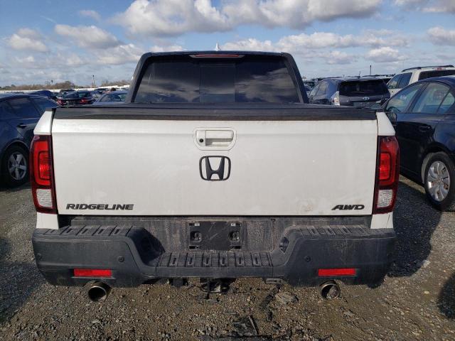 Photo 6 from auction – 2023 HONDA RIDGELINE with VIN 5FPYK3F80PB001356