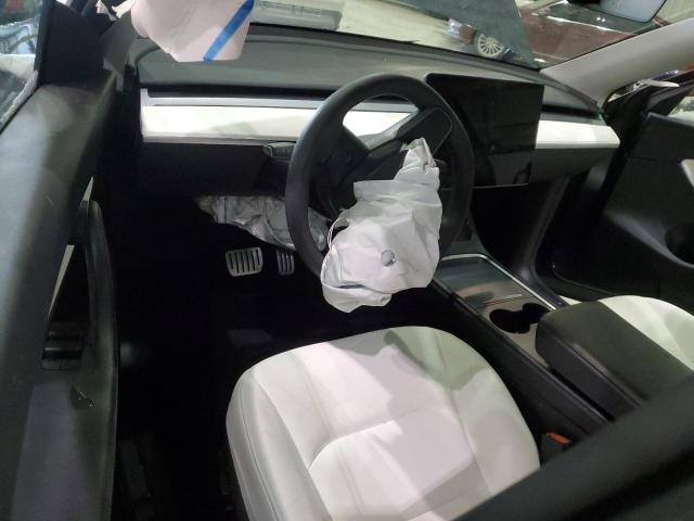 Photo 8 from auction – 2022 TESLA MODEL Y with VIN 7SAYGDEF6NF459595