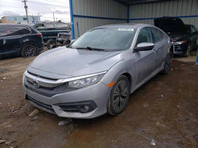 HONDA CIVIC EX 2016 with VIN 19XFC1F3XGE027667 - Photo from auction