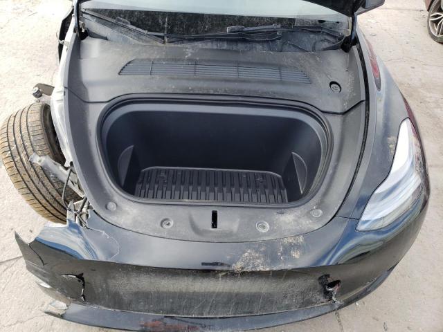 Photo 11 from auction – 2023 TESLA MODEL Y with VIN 7SAYGDEF5PF701909