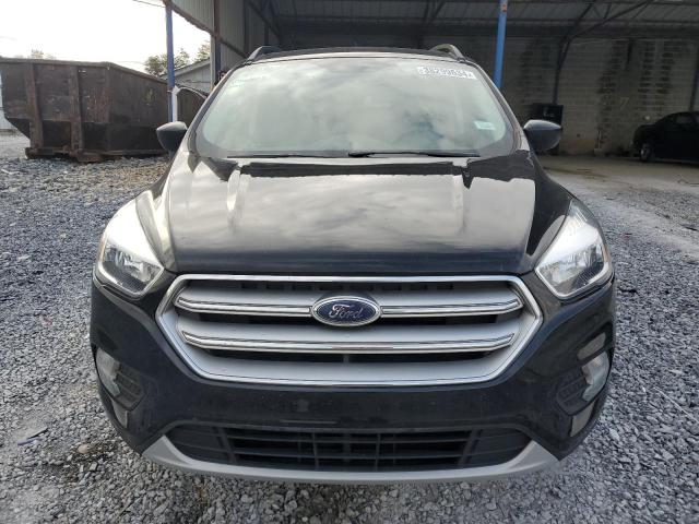 Photo 5 from auction – 2018 FORD ESCAPE SE with VIN 1FMCU9GD4JUD32933