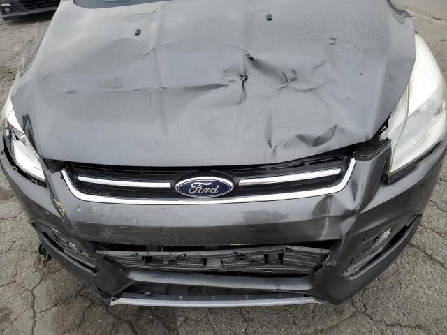 Photo 11 from auction – 2016 FORD ESCAPE TIT with VIN 1FMCU0J94GUB99356