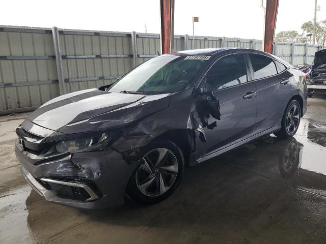 HONDA CIVIC LX 2020 with VIN 19XFC2F69LE016668 - Photo from auction