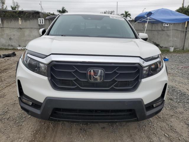 Photo 5 from auction – 2022 HONDA RIDGELINE with VIN 5FPYK3F77NB015534