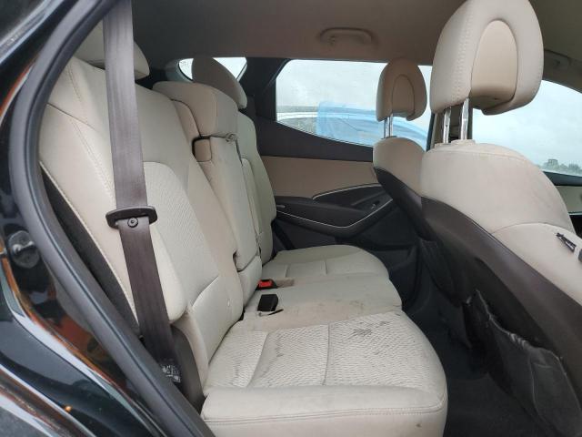 Photo 11 from auction – 2014 HYUNDAI SANTA FE S with VIN 5XYZU3LB3EG205193