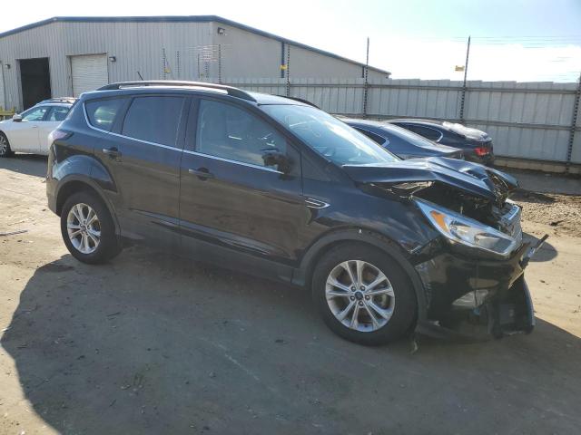 Photo 4 from auction – 2018 FORD ESCAPE SE with VIN 1FMCU0GD4JUA36712