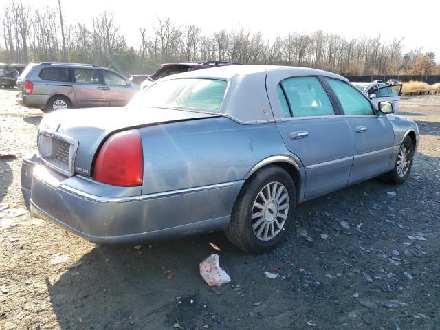 Photo 3 from auction – 2004 LINCOLN TOWN CAR E with VIN 1LNHM81W04Y687315
