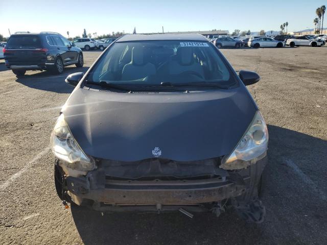 Photo 5 from auction – 2014 TOYOTA PRIUS C with VIN JTDKDTB37E1073695