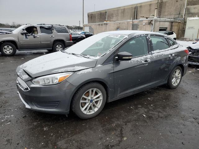 FORD FOCUS SE 2016 with VIN 1FADP3F24GL394351 - Photo from auction