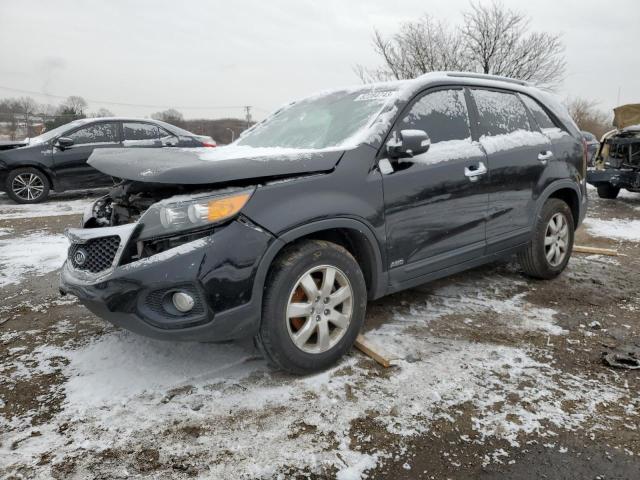 KIA SORENTO LX 2013 with VIN 5XYKTCA68DG387675 - Photo from auction