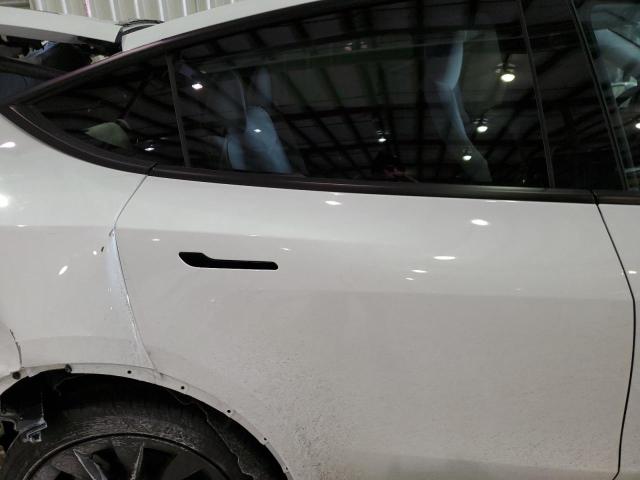 Photo 10 from auction – 2023 TESLA MODEL Y with VIN 7SAYGAEE7PF904368