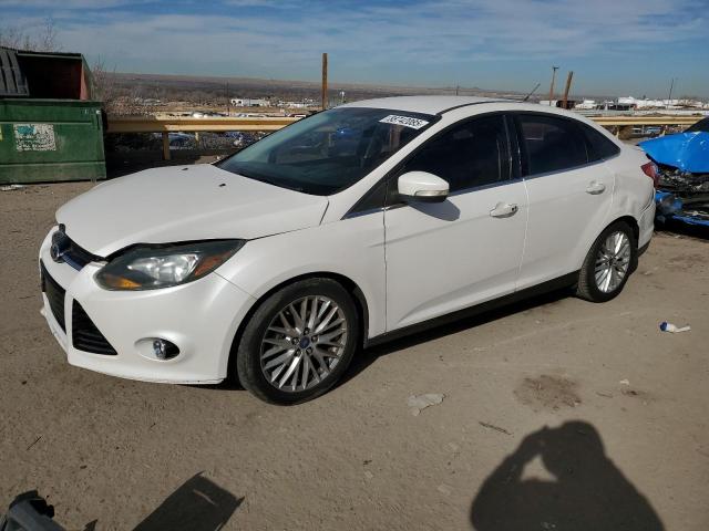 FORD FOCUS TITA 2014 with VIN 1FADP3J22EL161458 - Photo from auction