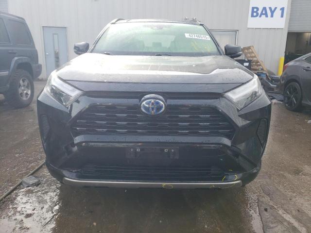 Photo 5 from auction – 2022 TOYOTA RAV4 SE with VIN JTM16RFV3ND051695