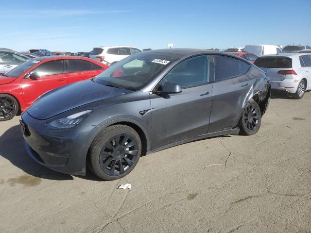 TESLA MODEL Y 2022 with VIN 7SAYGDEE6NF494130 - Photo from auction