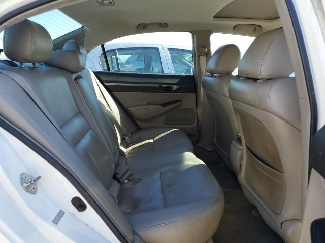 Photo 10 from auction – 2010 HONDA CIVIC EX with VIN 19XFA1F80AE072089
