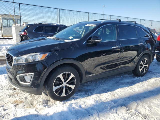 KIA SORENTO EX 2017 with VIN 5XYPHDA58HG291135 - Photo from auction
