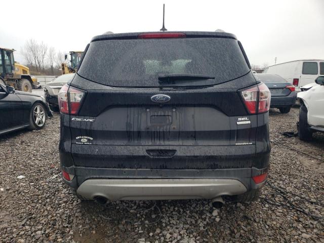 Photo 6 from auction – 2018 FORD ESCAPE SEL with VIN 1FMCU0HD7JUA16064