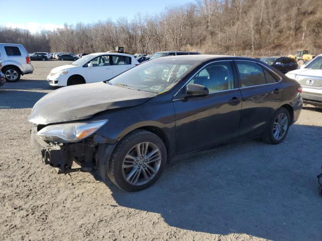 TOYOTA CAMRY LE 2017 with VIN 4T1BF1FK9HU394748 - Photo from auction