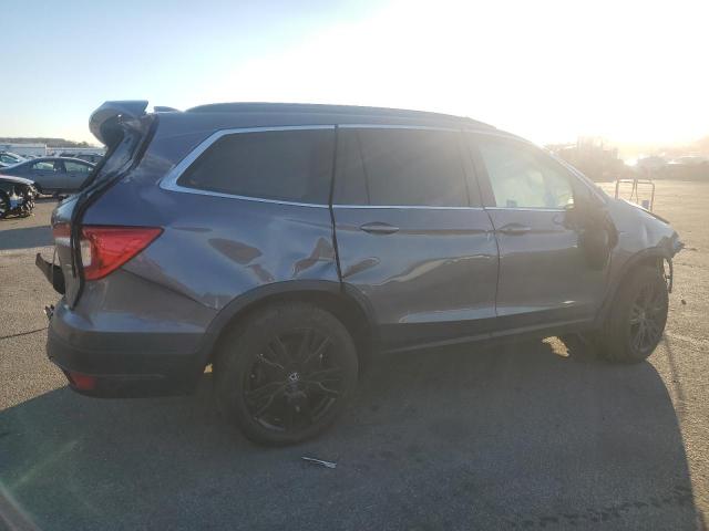 Photo 3 from auction – 2022 HONDA PILOT SE with VIN 5FNYF6H23NB036400
