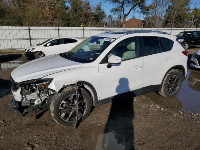 MAZDA CX-5 GT 2016 with VIN JM3KE4DY6G0910111 - Photo from auction