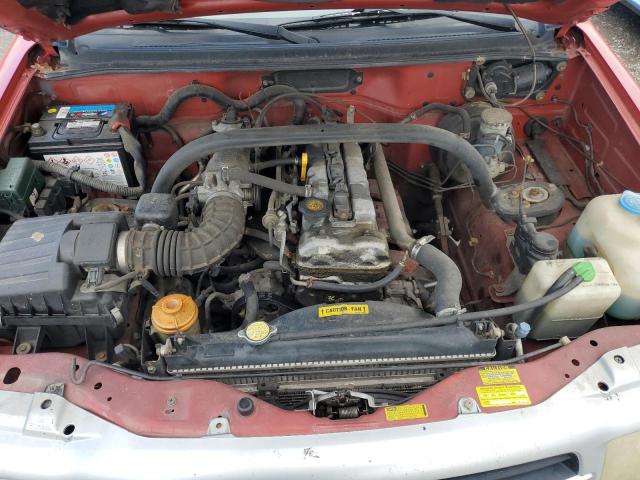 Photo 11 from auction – 1999 CHEVROLET TRACKER with VIN 2CNBJ13C2X6922039