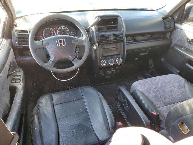 Photo 8 from auction – 2004 HONDA CR-V LX with VIN JHLRD68414C009688