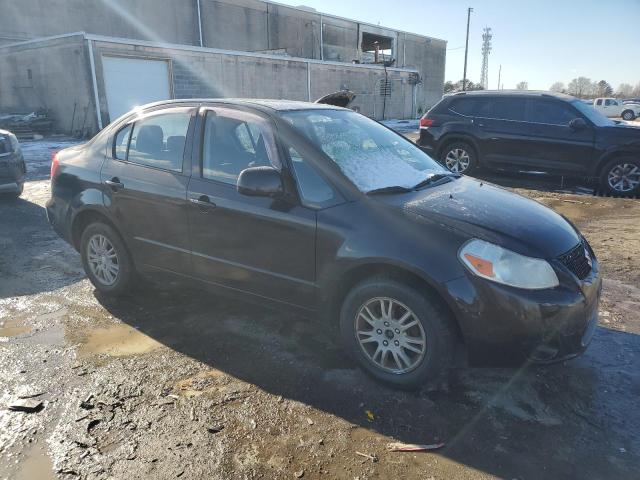 Foto 4 de la subasta – 2012 SUZUKI SX4 LE con VIN JS2YC5A3XC6303083